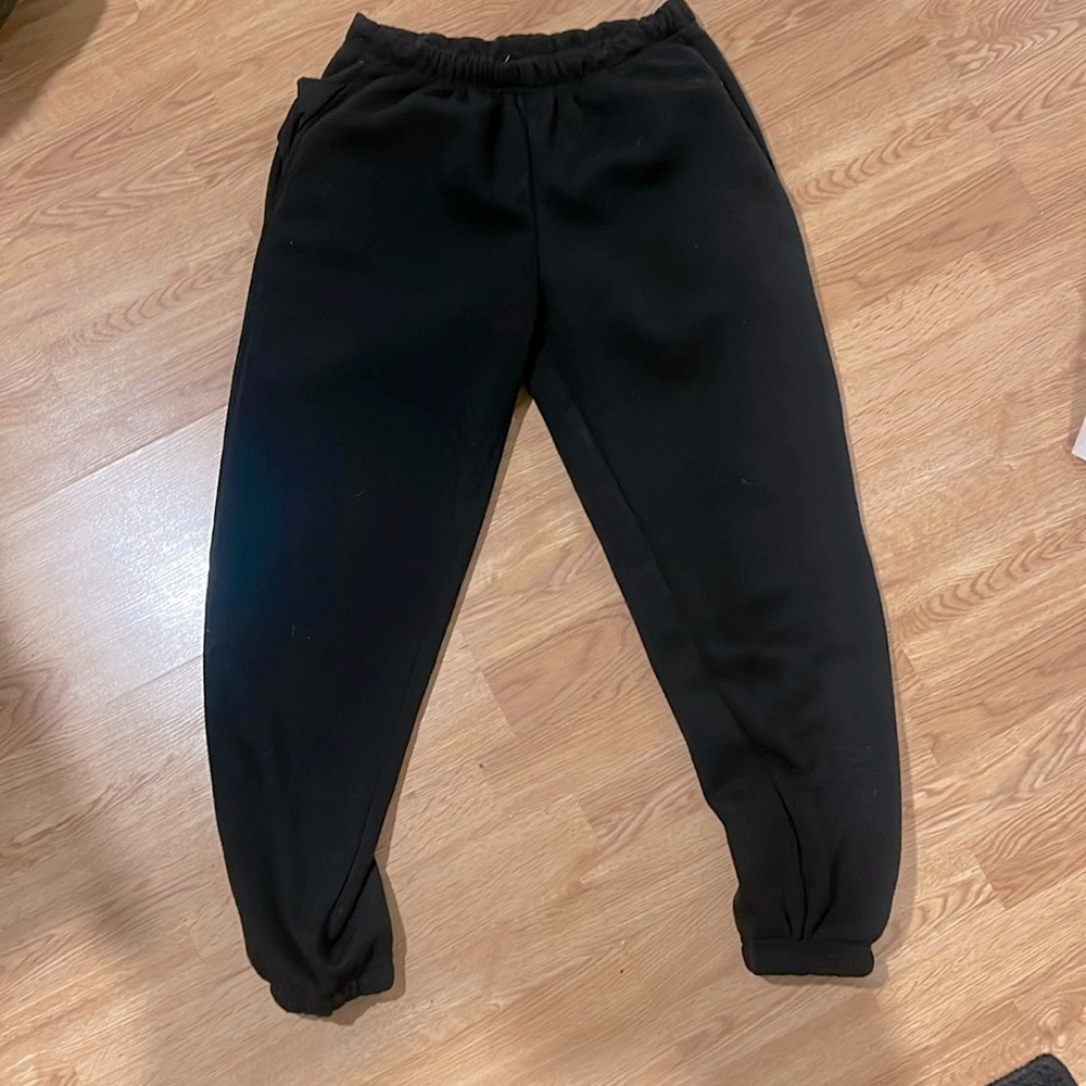 Black pair of H&M joggers.